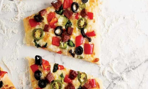 Spinat-Wurst-Pizza